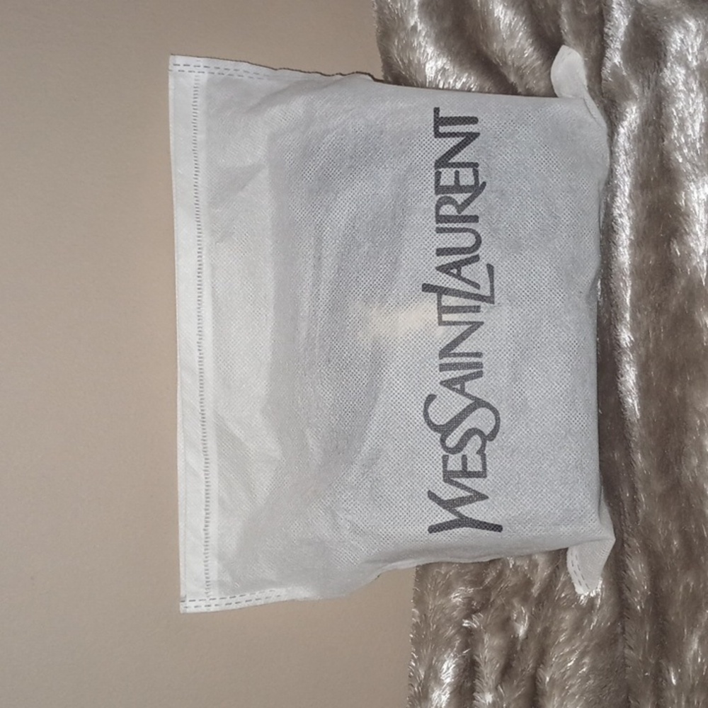 Yves saint laurent purse black . Brand new never used